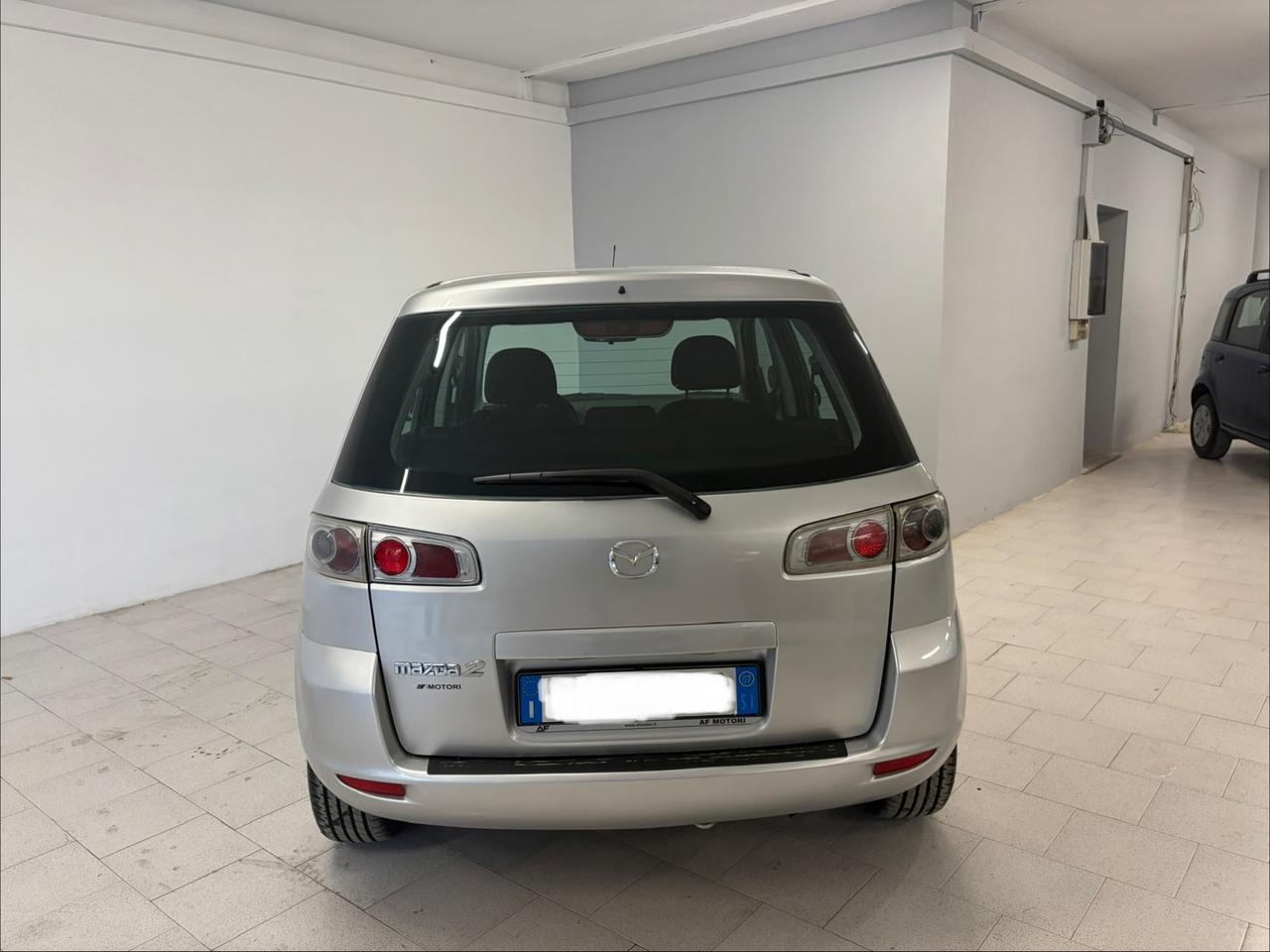 Mazda 2 1.4 Tdi 68 cv Sony ericsson