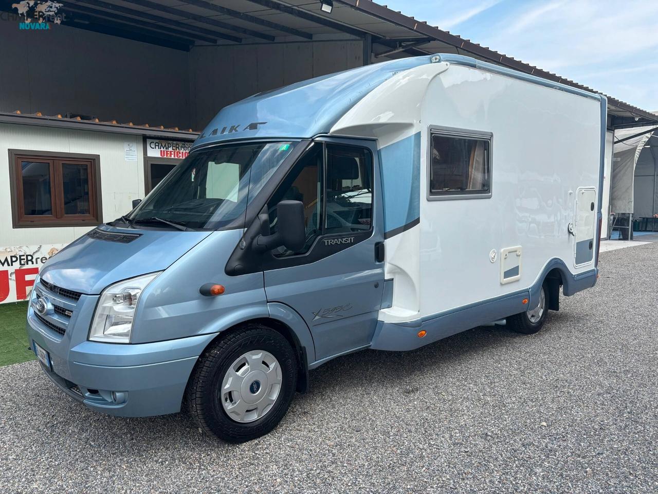 LAIKA X 595 C VAN - Semintegrale con letto matrimoniale in coda e garage (volume interno 68x103 )