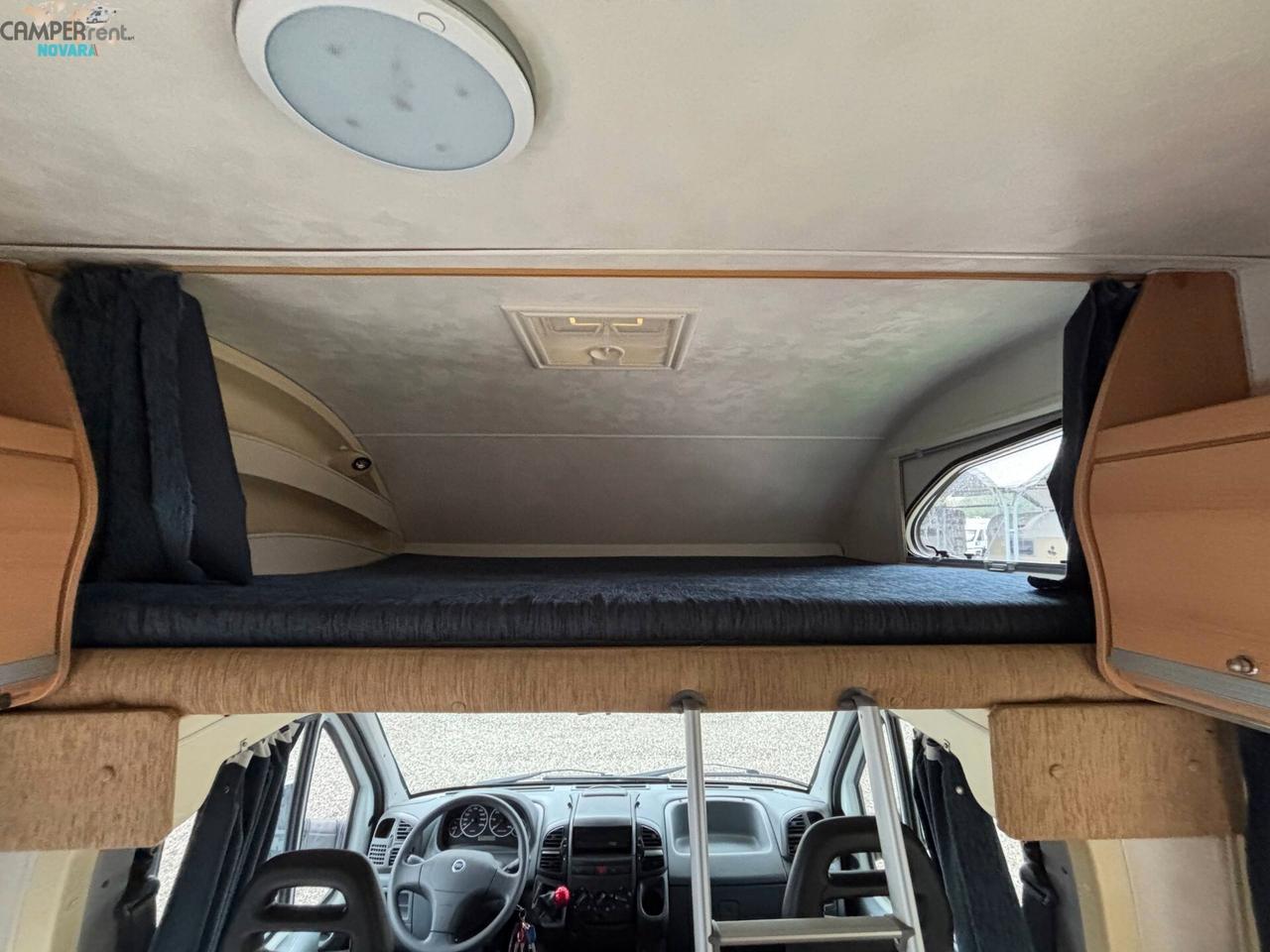 ELNAGH SUPER D 111 c - mansardato con letti a castello in coda e garage a volume variabile