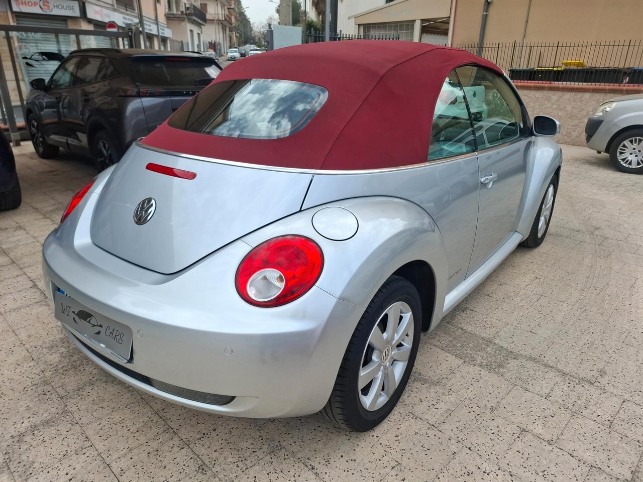 Volkswagen New Beetle Cabriolet - 1.4-16V Highline
