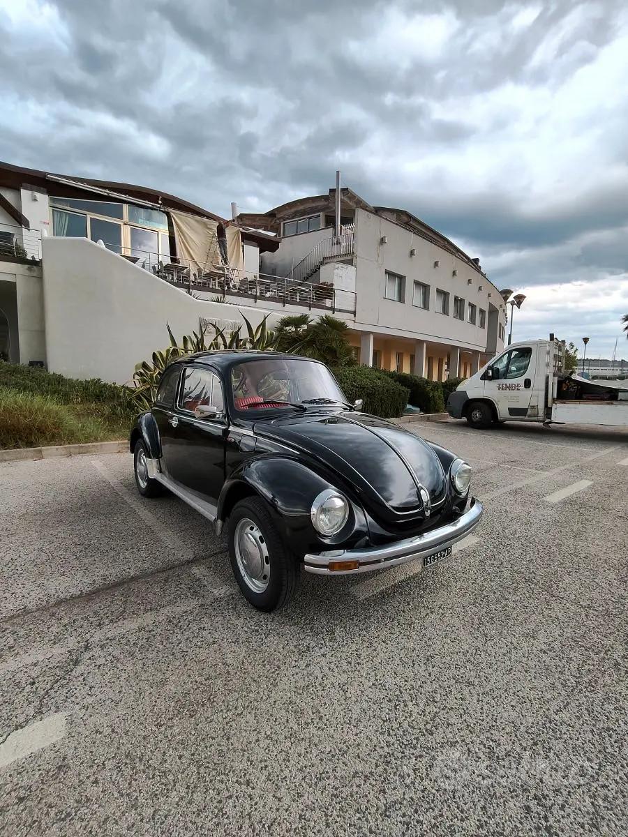 Volkswagen new Beatle maggiolino restauro completo