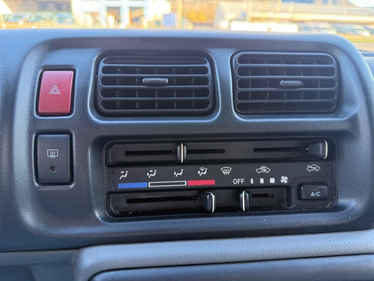 Suzuki Jimny - 1.3i 4WD JLX