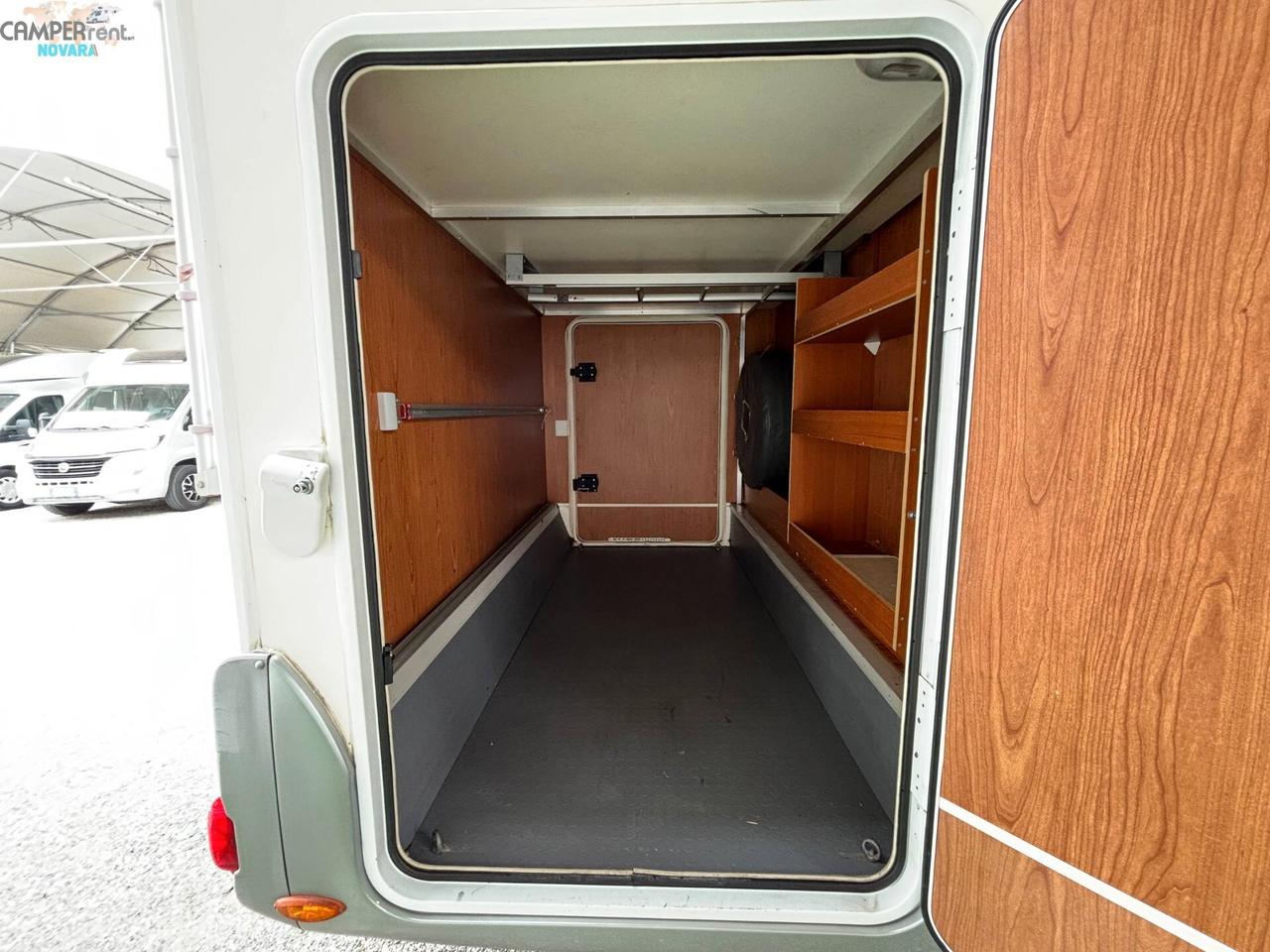 RIMOR EUROPEO 87 PLUS EVO - Semintegrale con letto basculante ed ampio garage