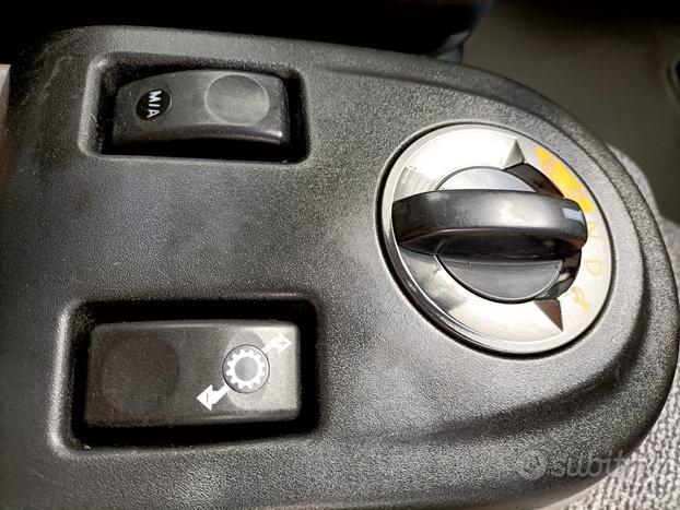 DAF LF 55 280 centina e sponda caricatrice