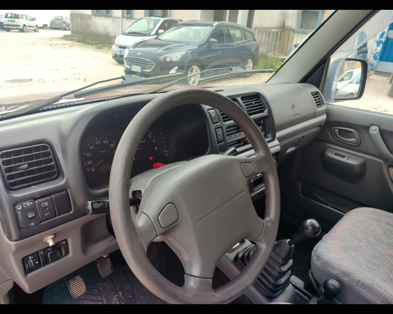 SUZUKI Jimny 3ª serie - Jimny 1.3i 16V cat 4WD JLX