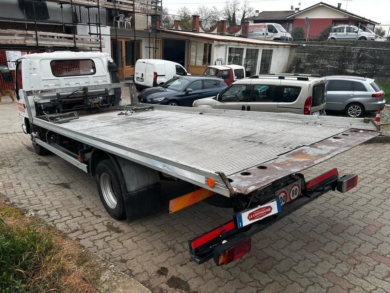 Isuzu NPR Isuzu Carro attrezzi port. utile KG2590