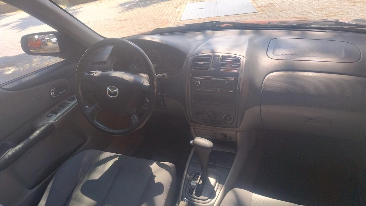 Mazda 323 F 1.6i 16V C. Autom. ASI-CRS clima Ok Neopat.
