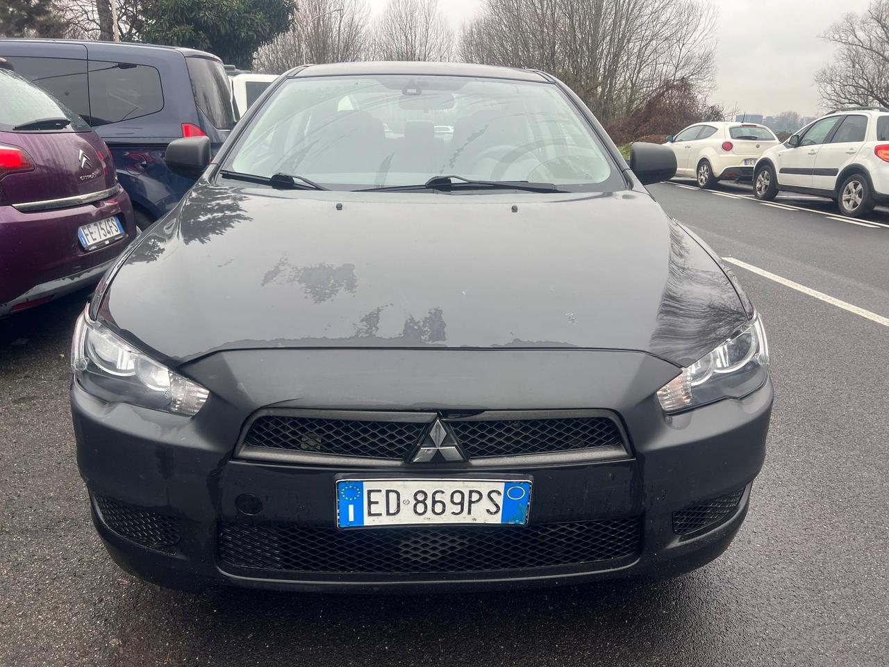 Mitsubishi Lancer 1.5 4p. Invite