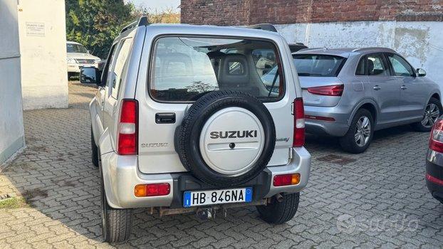 SUZUKI Jimny 1.3i 16V cat 4WD JX