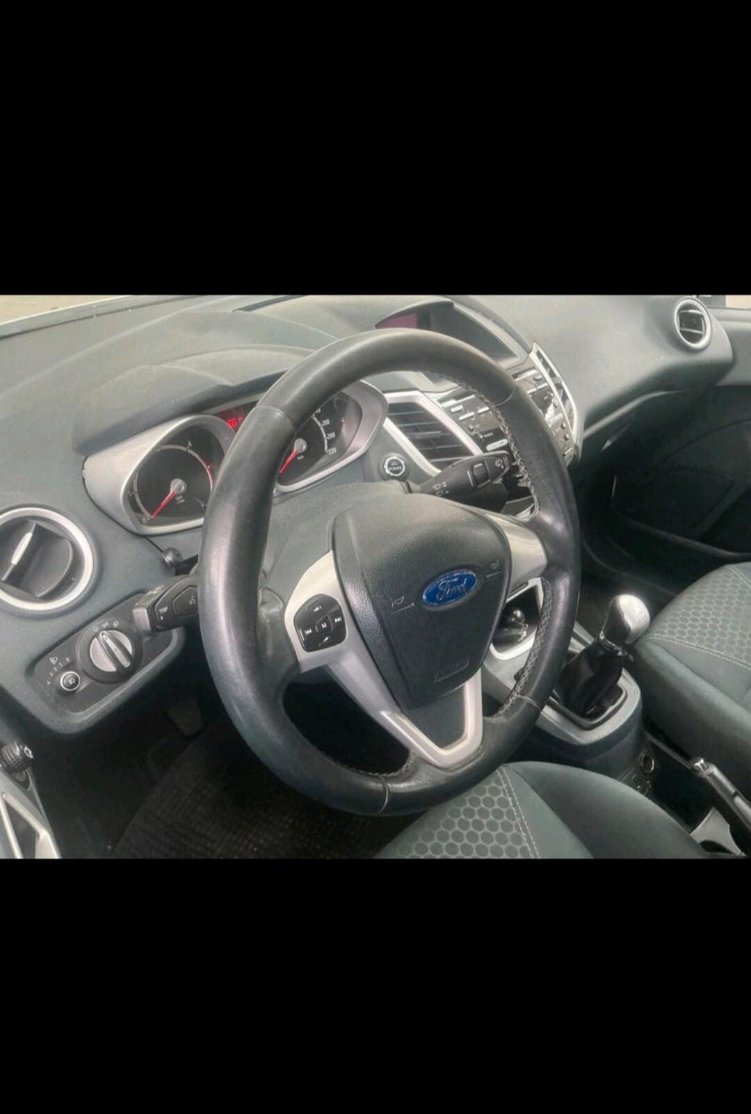 Ford Fiesta 1.4 TDCi 70CV 3 porte Titanium 2013