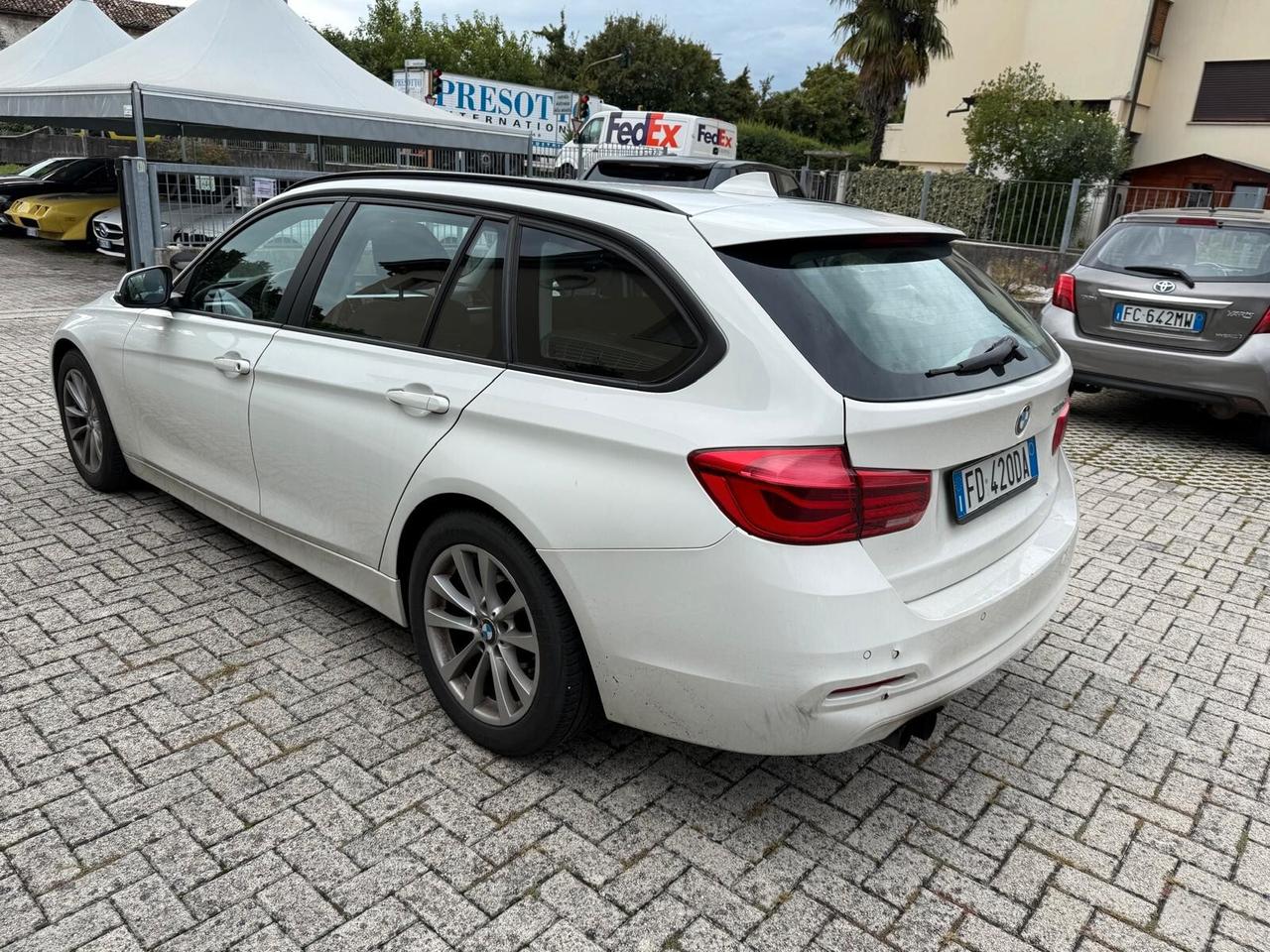 Bmw 320D + doppio tetto panoramico