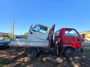 Nissan Cabstar con gru