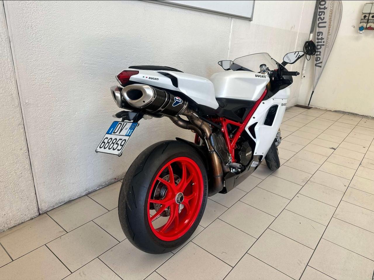 Ducati 848 EVO-LEGGI SOTTO