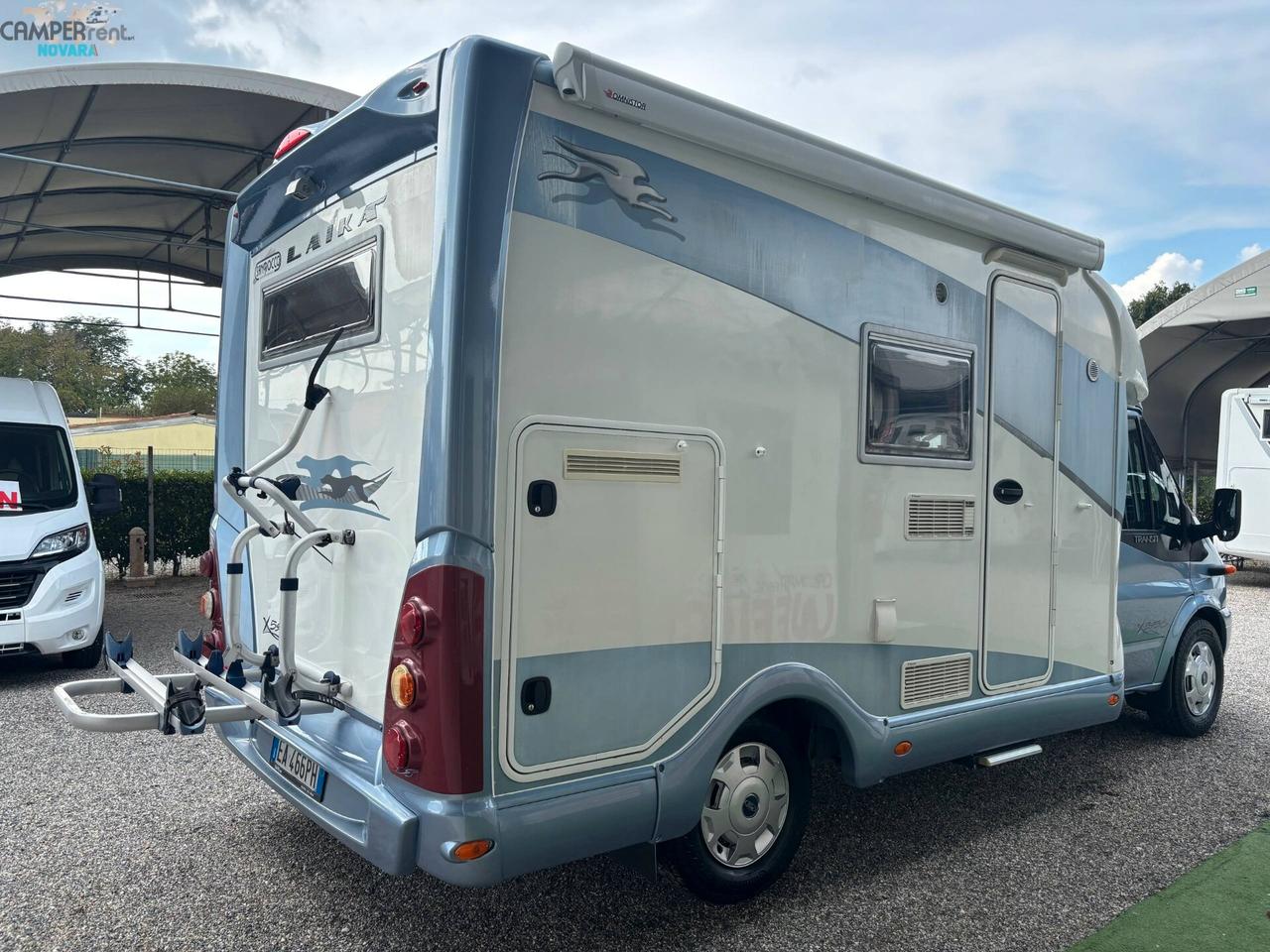 LAIKA X 595 C VAN - Semintegrale con letto matrimoniale in coda e garage (volume interno 68x103 )