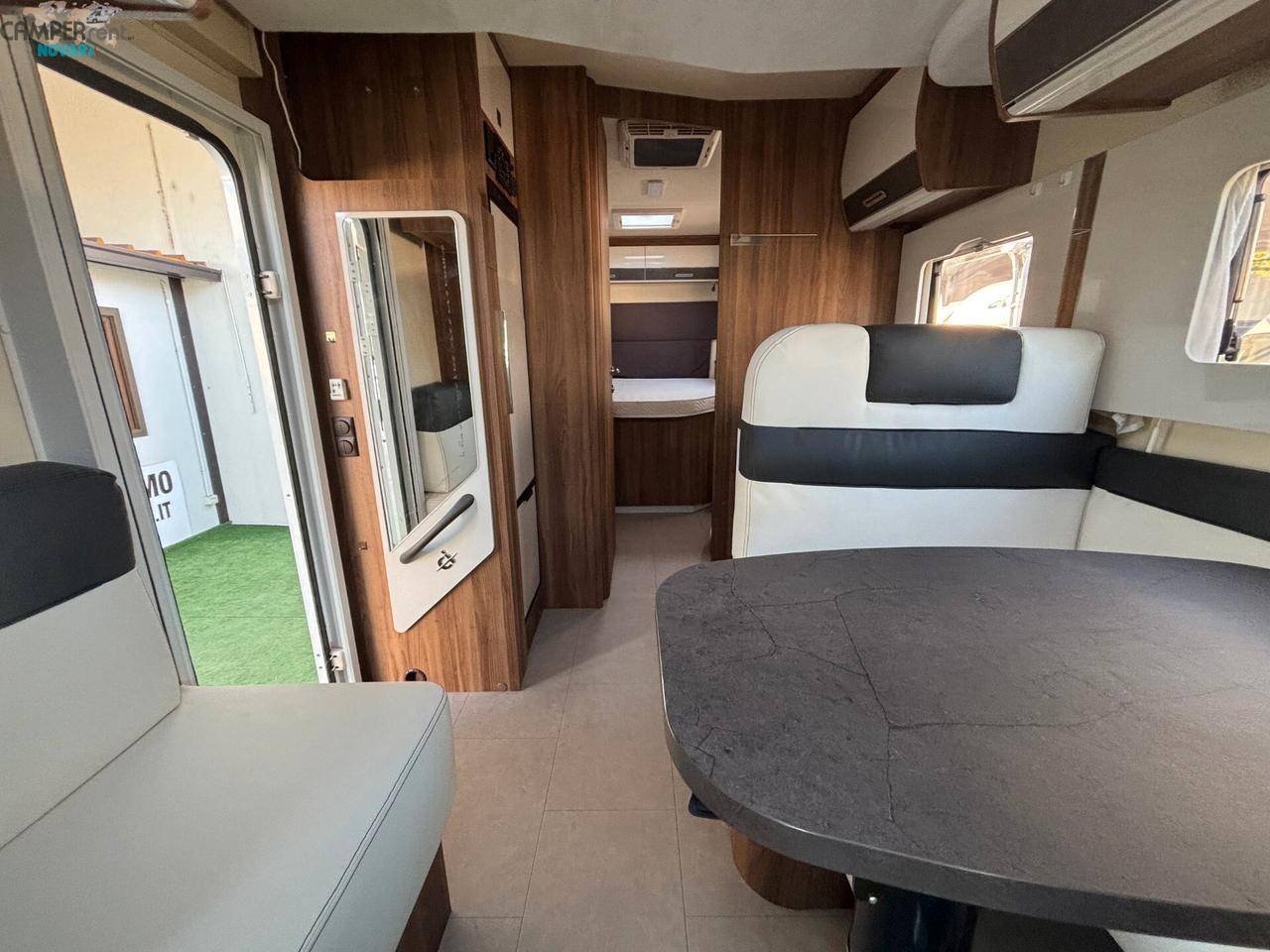 CI MAGIS 65 XT - Semintegrale con letto nautico ad altezza variabile ed ampio garage