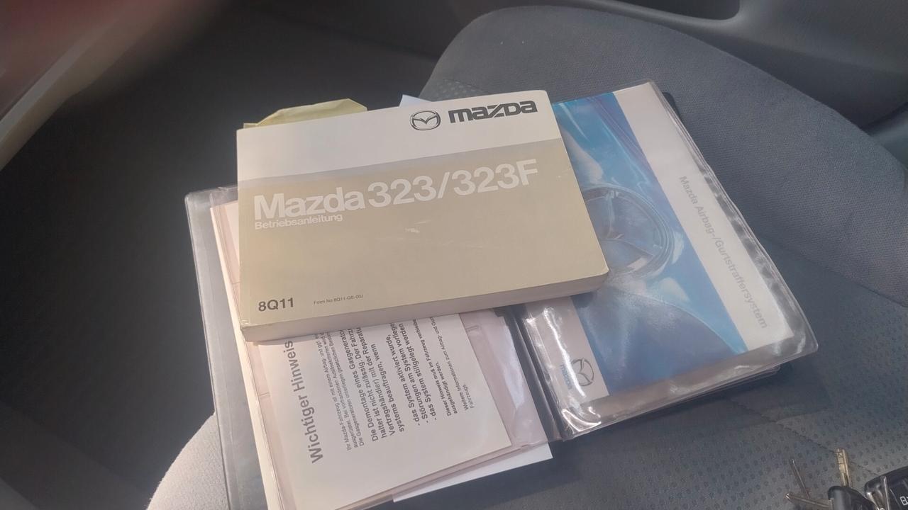Mazda 323 F 1.6i 16V C. Autom. ASI-CRS clima Ok Neopat.