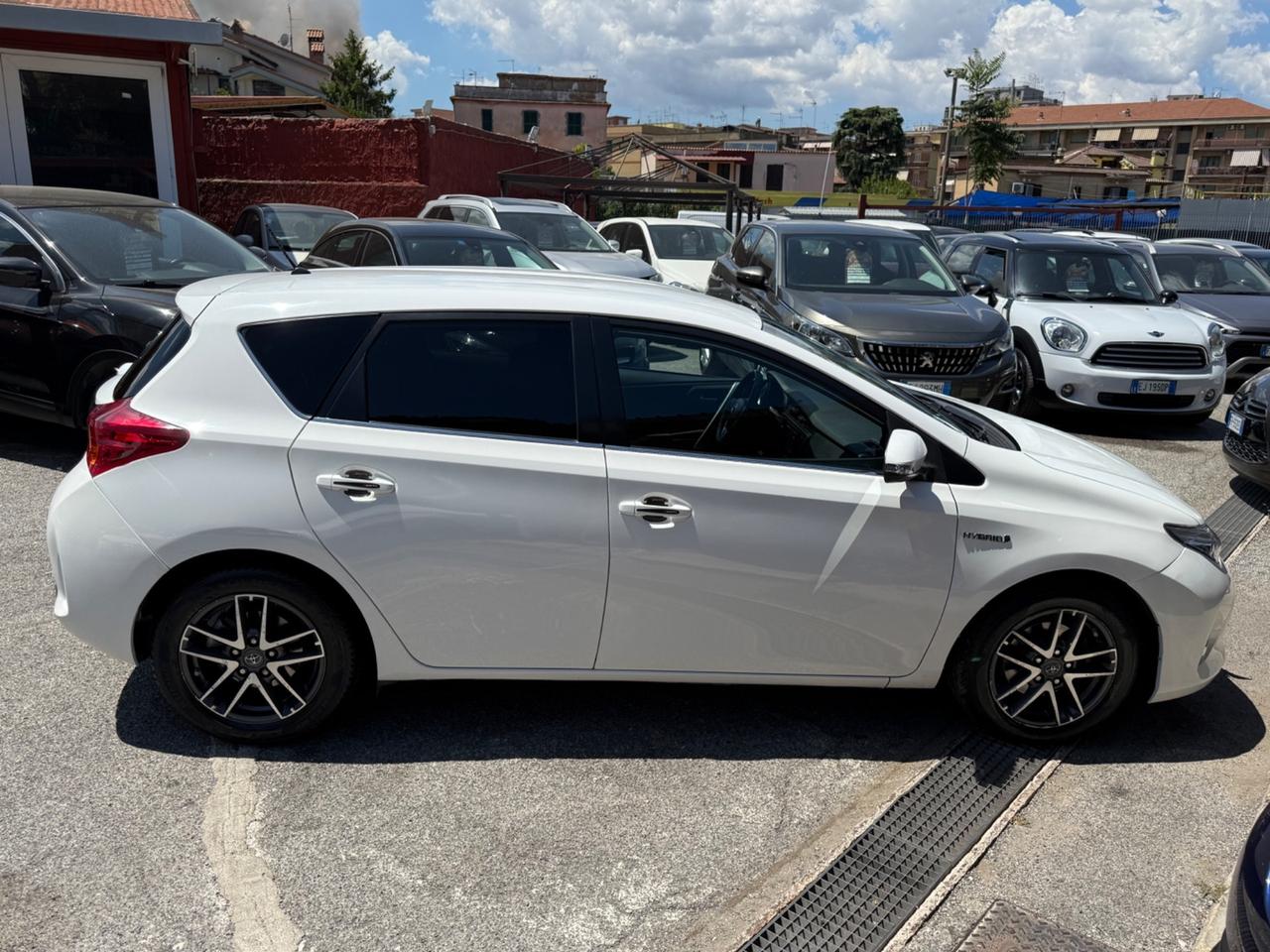 Auris 1.8 Hybrid Lounge-unipro-rate-