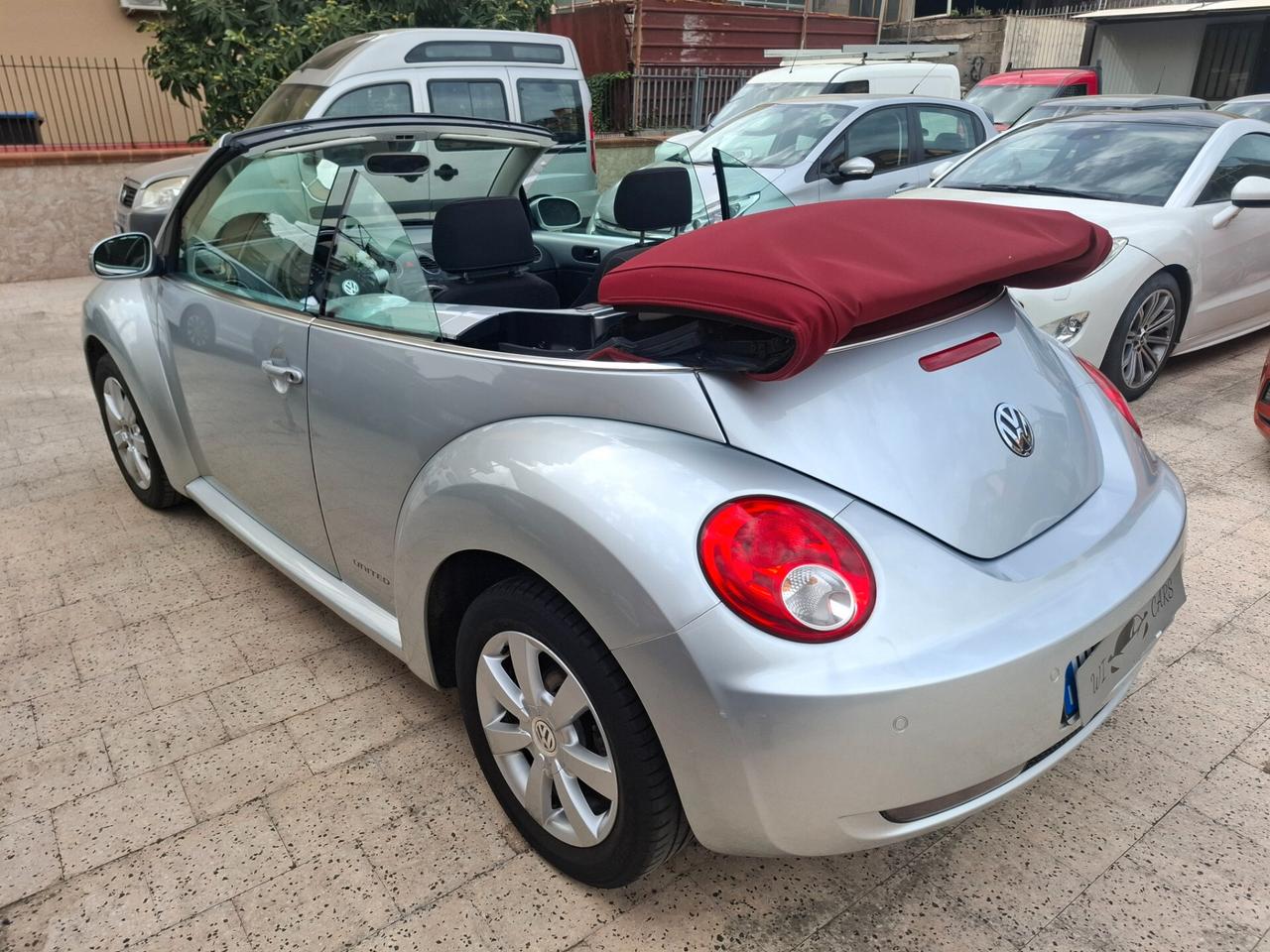 Volkswagen New Beetle Cabriolet - 1.4-16V Highline