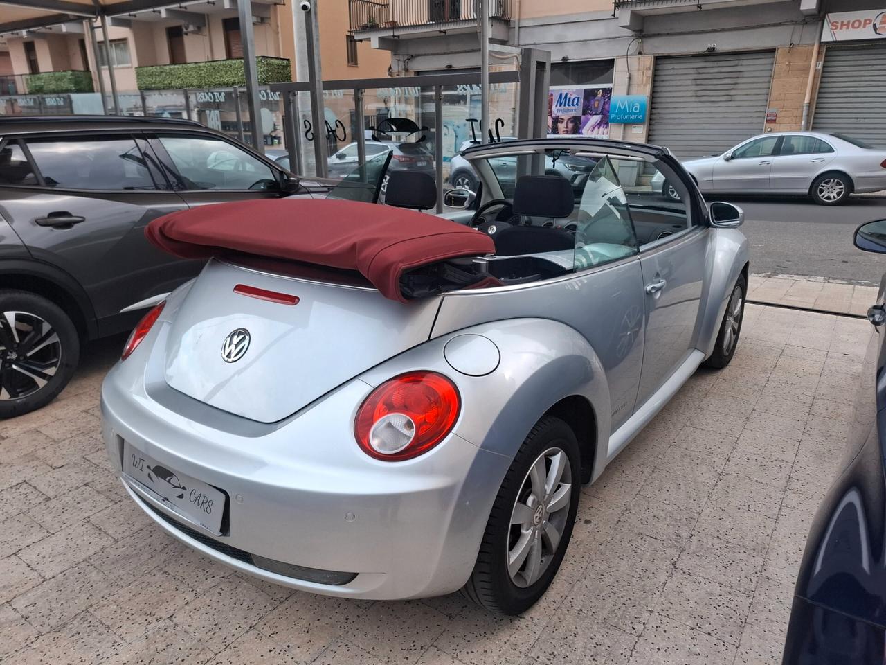 Volkswagen New Beetle Cabriolet - 1.4-16V Highline