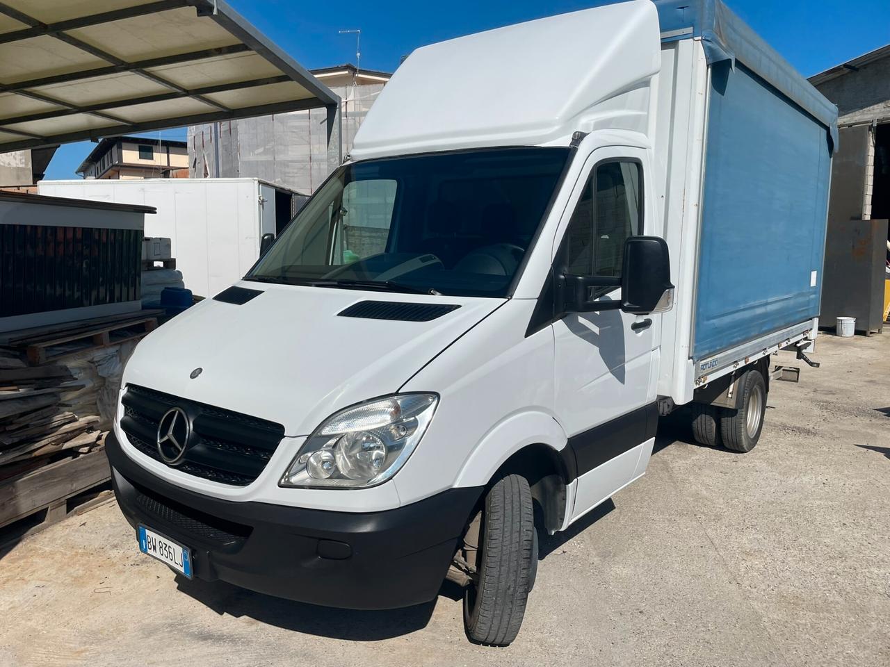 MERCEDES SPRINTER 411 CENTINATO CON TELO SCORREVOLE E PEDANA IDRAULICA DHOLLANDIA 10 QUINTALI