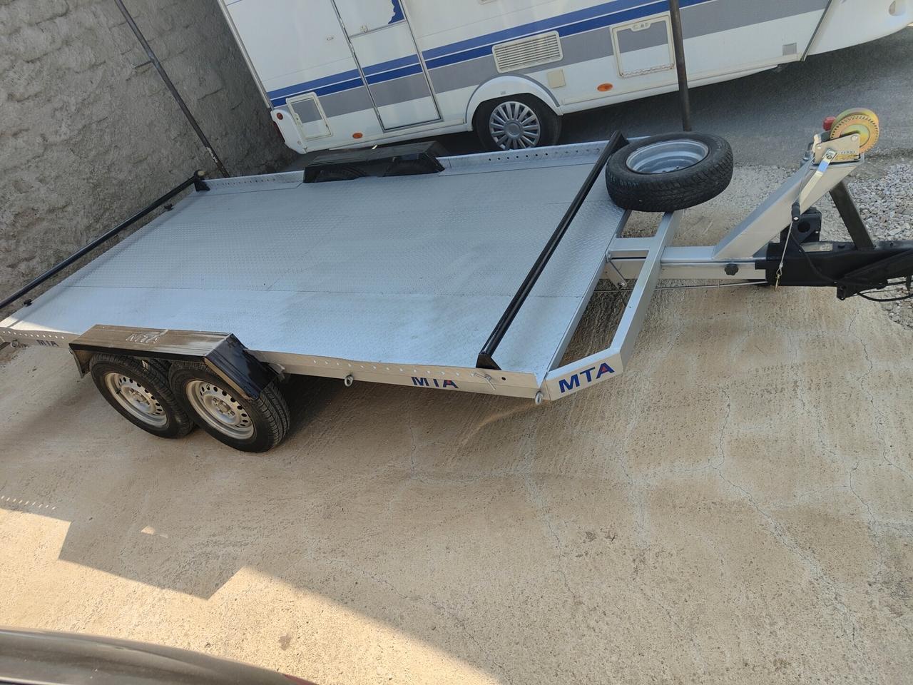 Rimorchio auto basculante con rampe