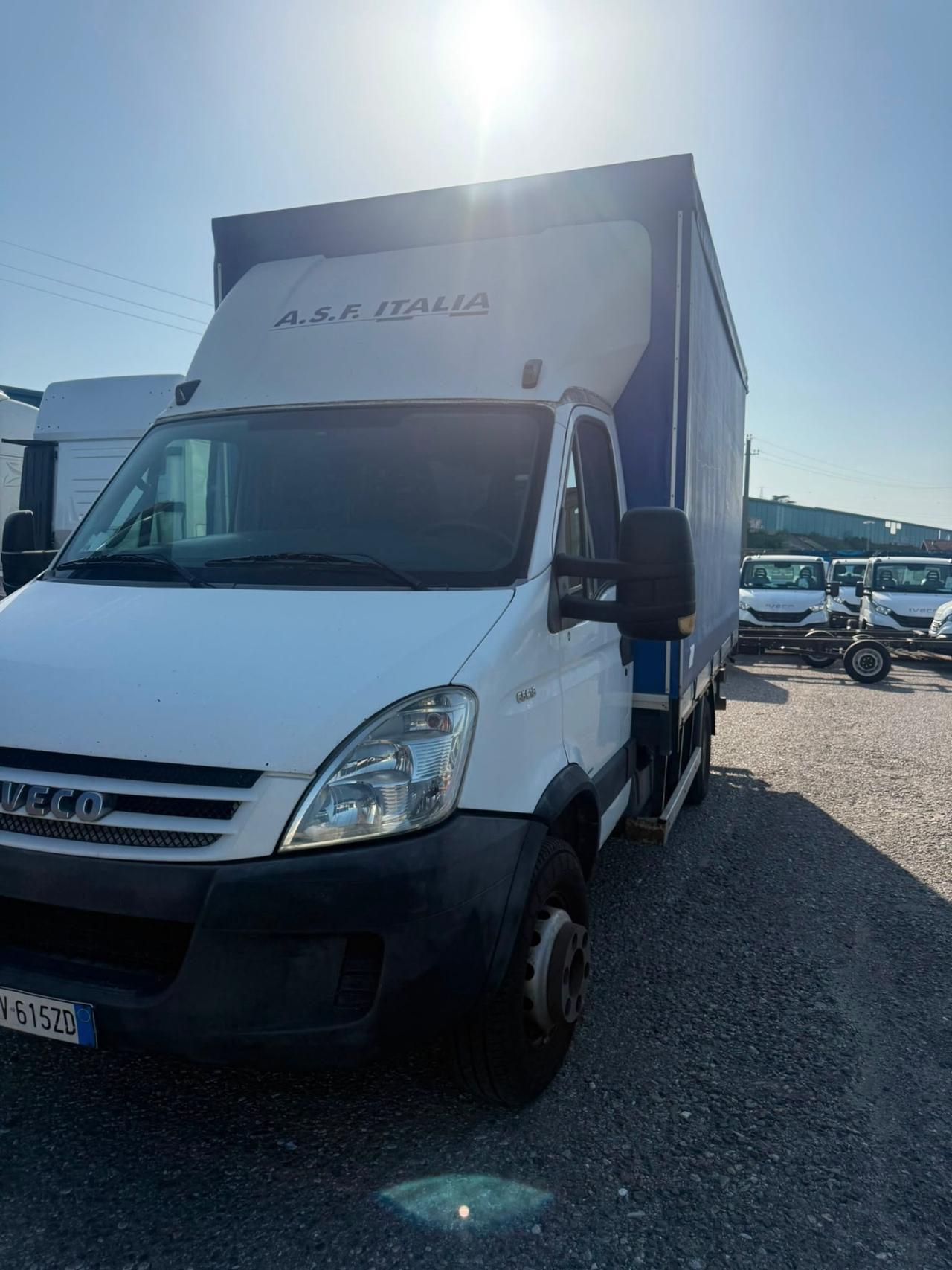 Iveco Dailly 65 con telone e pedana idraulica