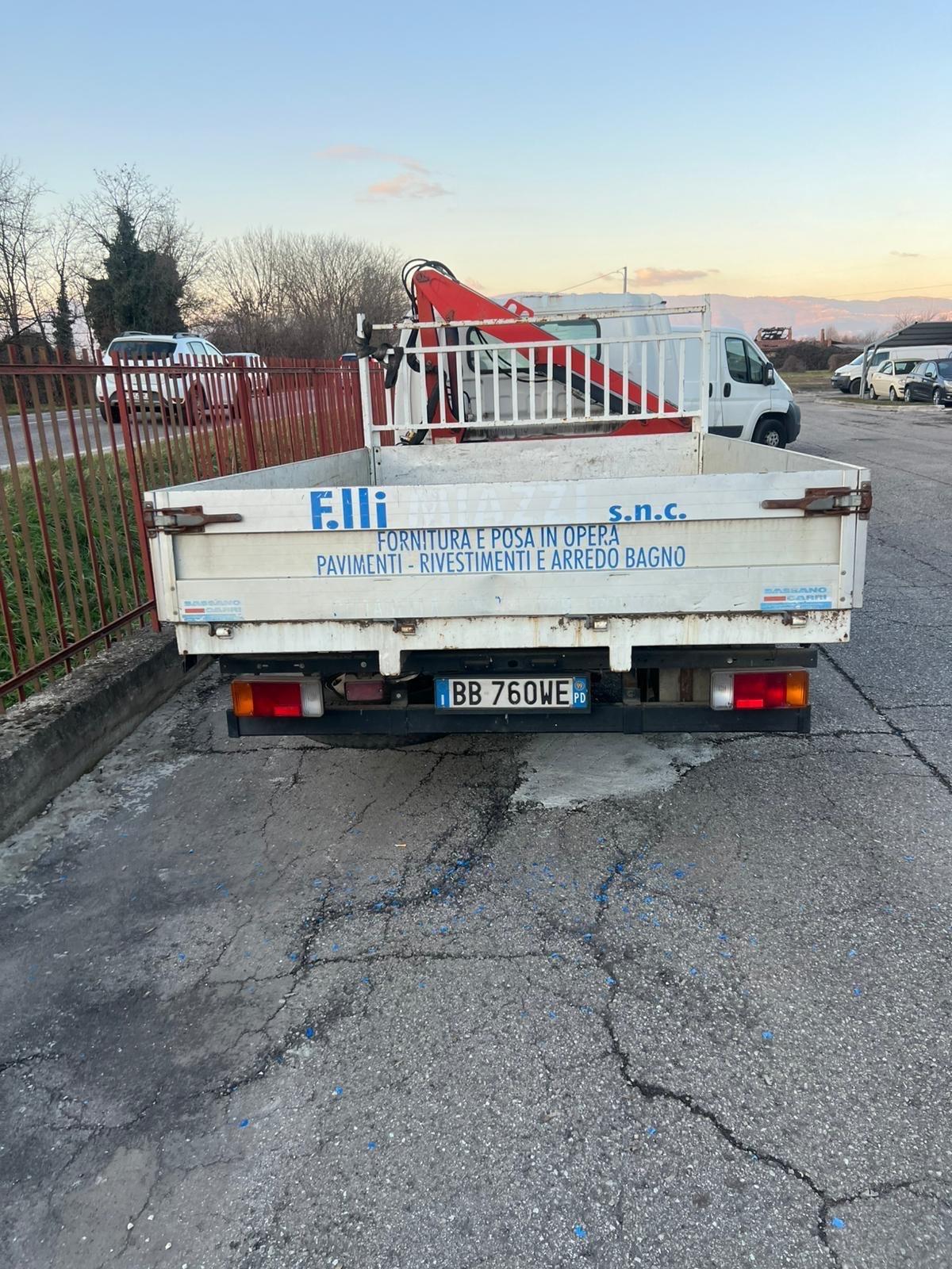 ISUZU CON GRU CASSONE FISSO