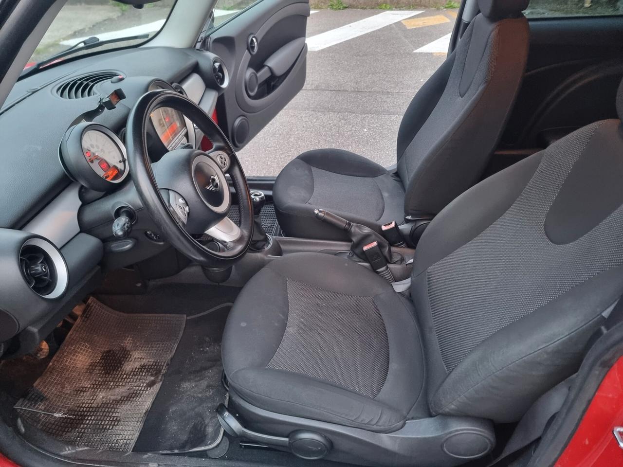 Mini 1.4 16V One Candele da cambiare