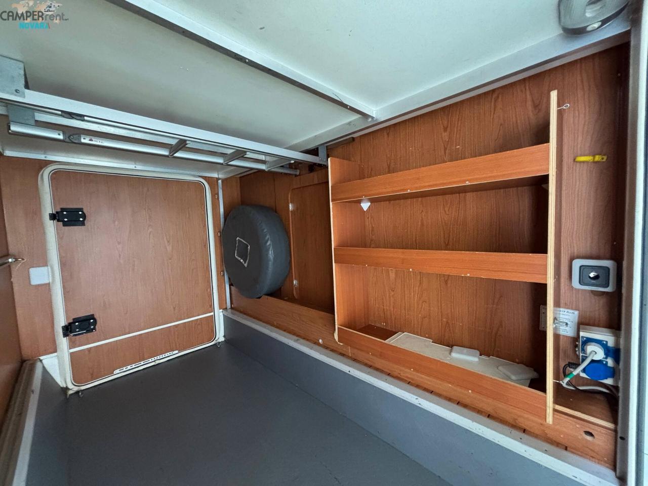 RIMOR EUROPEO 87 PLUS EVO - Semintegrale con letto basculante ed ampio garage