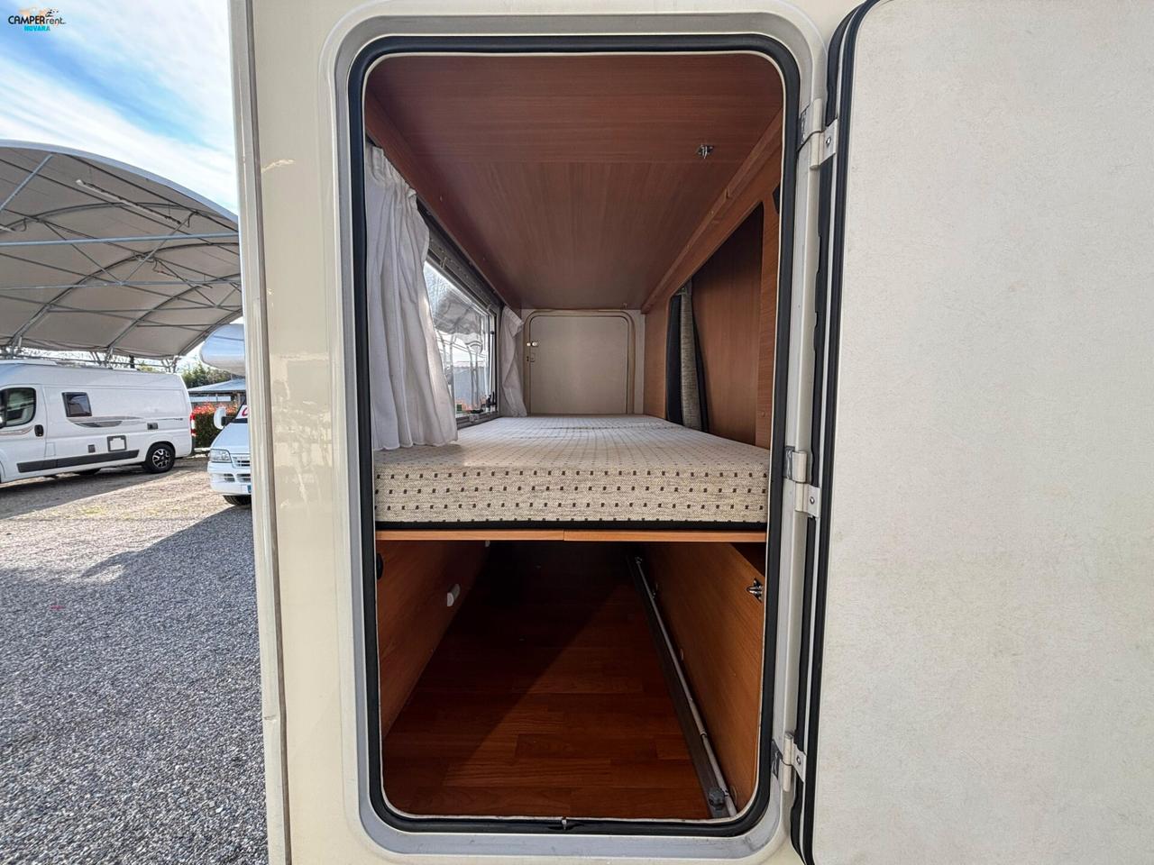 Mobilvetta TOP DRIVER S 70 - Mansardato compatto con letti a castello in coda