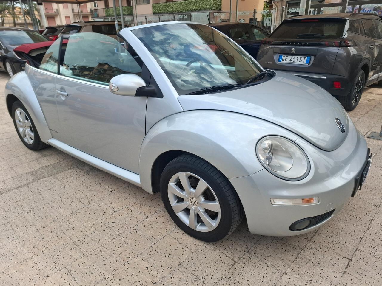 Volkswagen New Beetle Cabriolet - 1.4-16V Highline