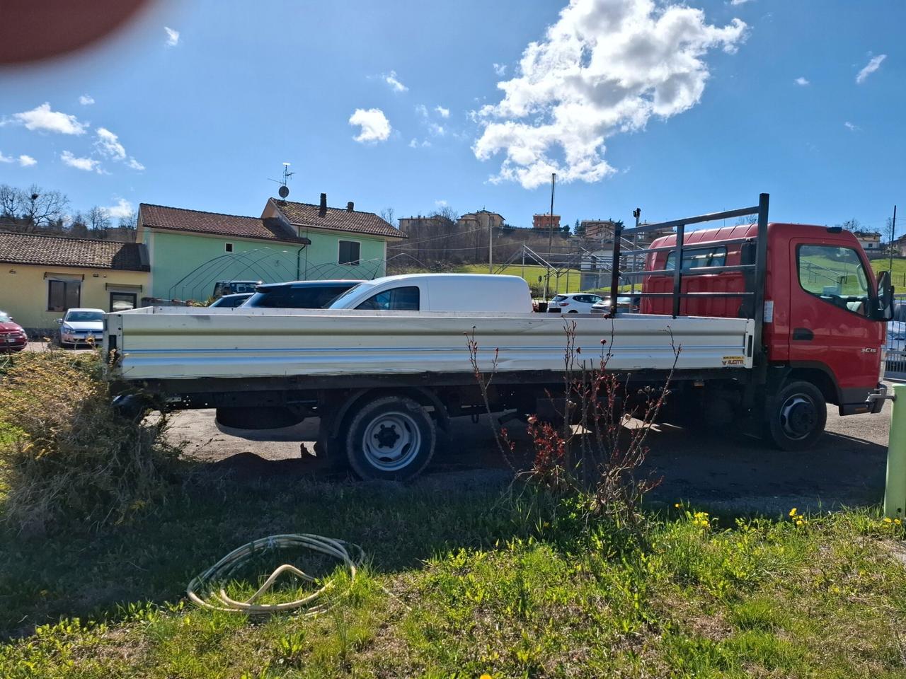 Mitsubishi Canter con cassone di 5 mt