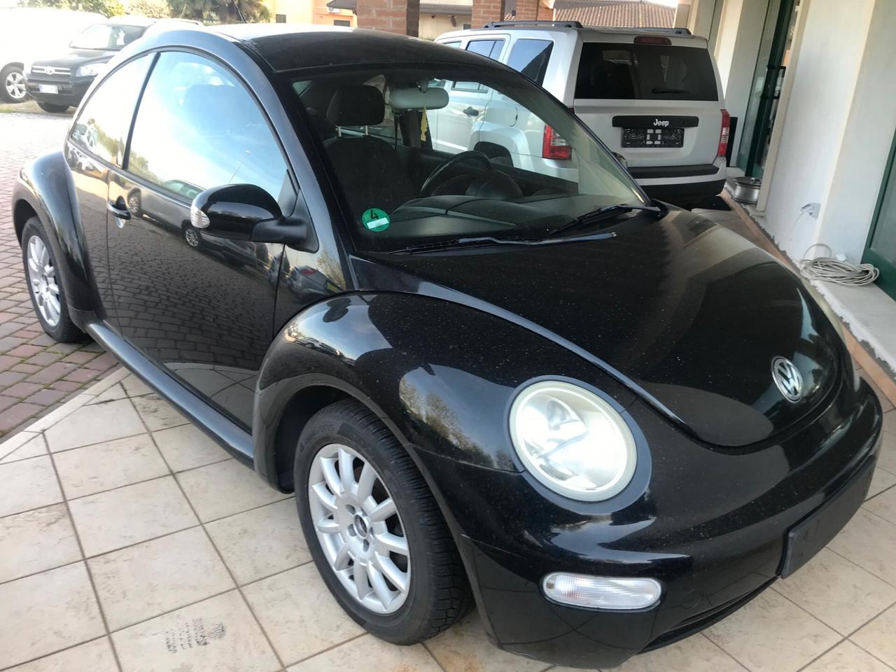 Volkswagen New Beetle 1.4 benzina 55 kw cabrio