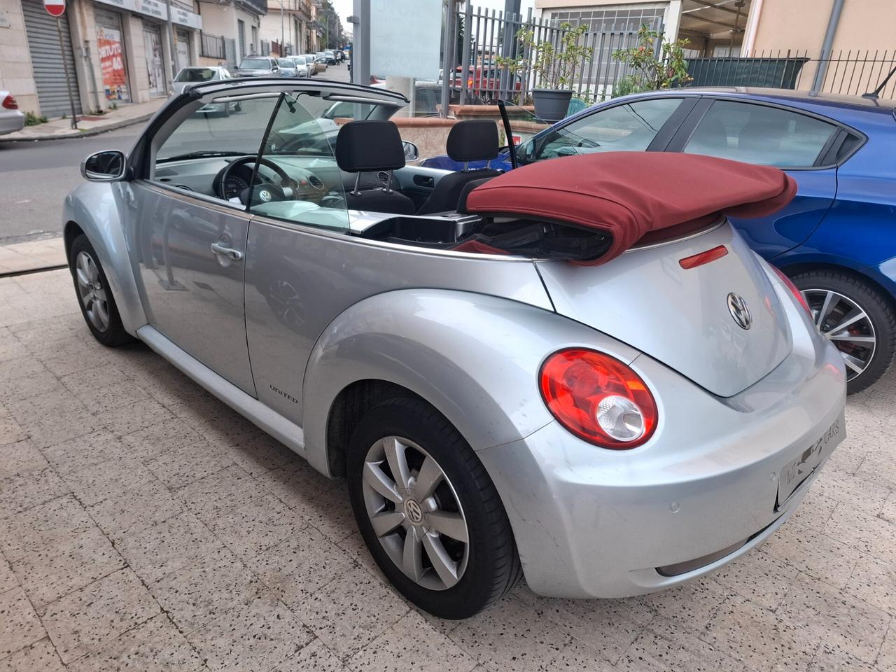 Volkswagen New Beetle Cabriolet - 1.4-16V Highline