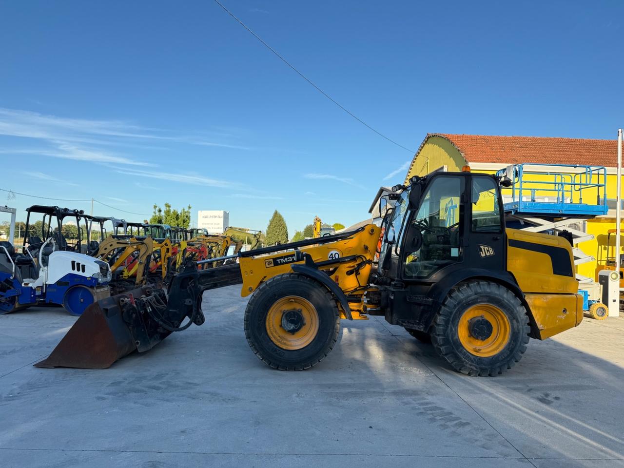 Pala gommata telescopica JCB TM310 AGRI