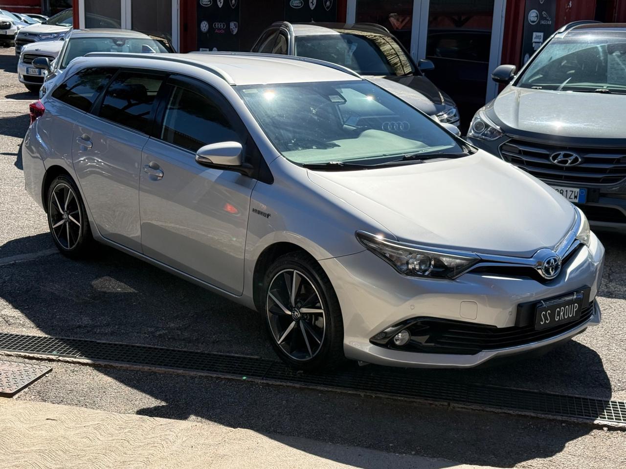 Auris Touring Sports 1.8 Hybrid Lounge-70 mila km -unipro