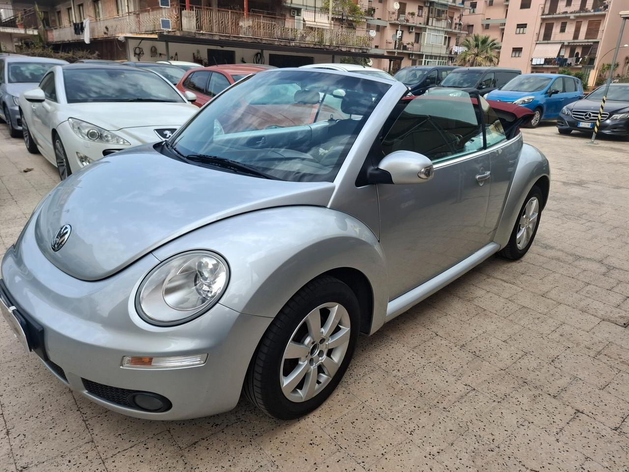 Volkswagen New Beetle Cabriolet - 1.4-16V Highline