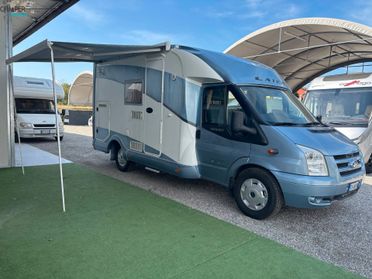 LAIKA X 595 C VAN - Semintegrale con letto matrimoniale in coda e garage (volume interno 68x103 )