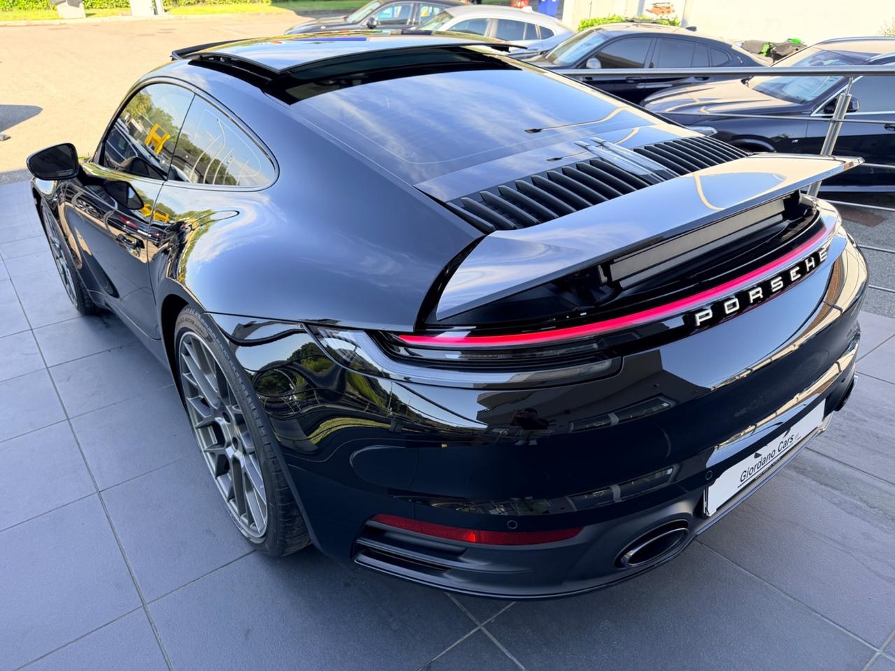 Porsche 911 Carrera total black cerchi 21 scarico sportivo