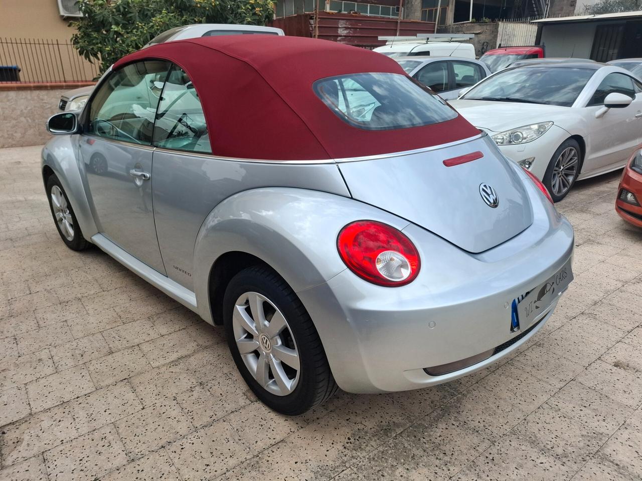Volkswagen New Beetle Cabriolet - 1.4-16V Highline