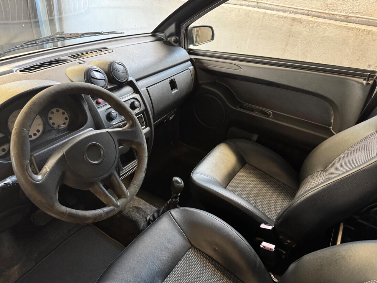 Aixam Bianco Perla Trasporto e Permute