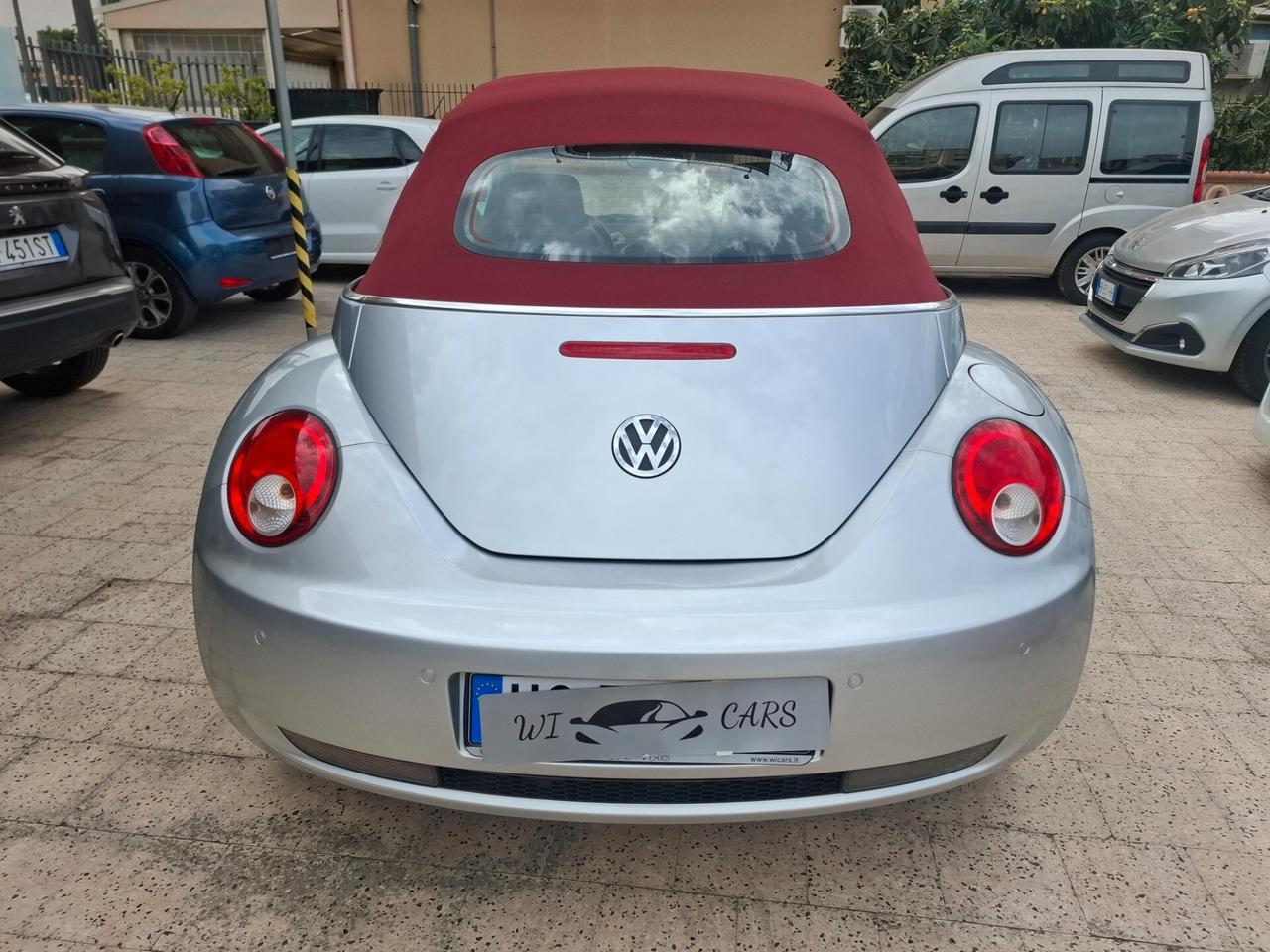 Volkswagen New Beetle Cabriolet - 1.4-16V Highline