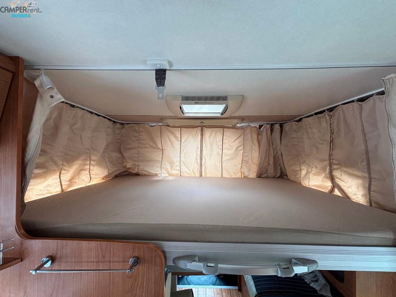 RIMOR EUROPEO 87 PLUS EVO - Semintegrale con letto basculante ed ampio garage