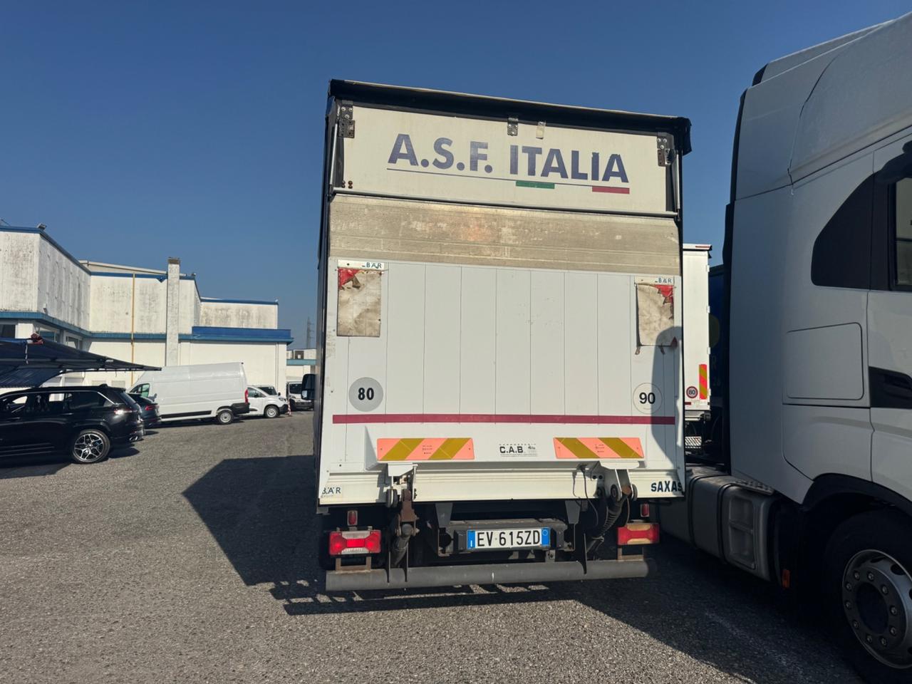 Iveco Dailly 65 con telone e pedana idraulica