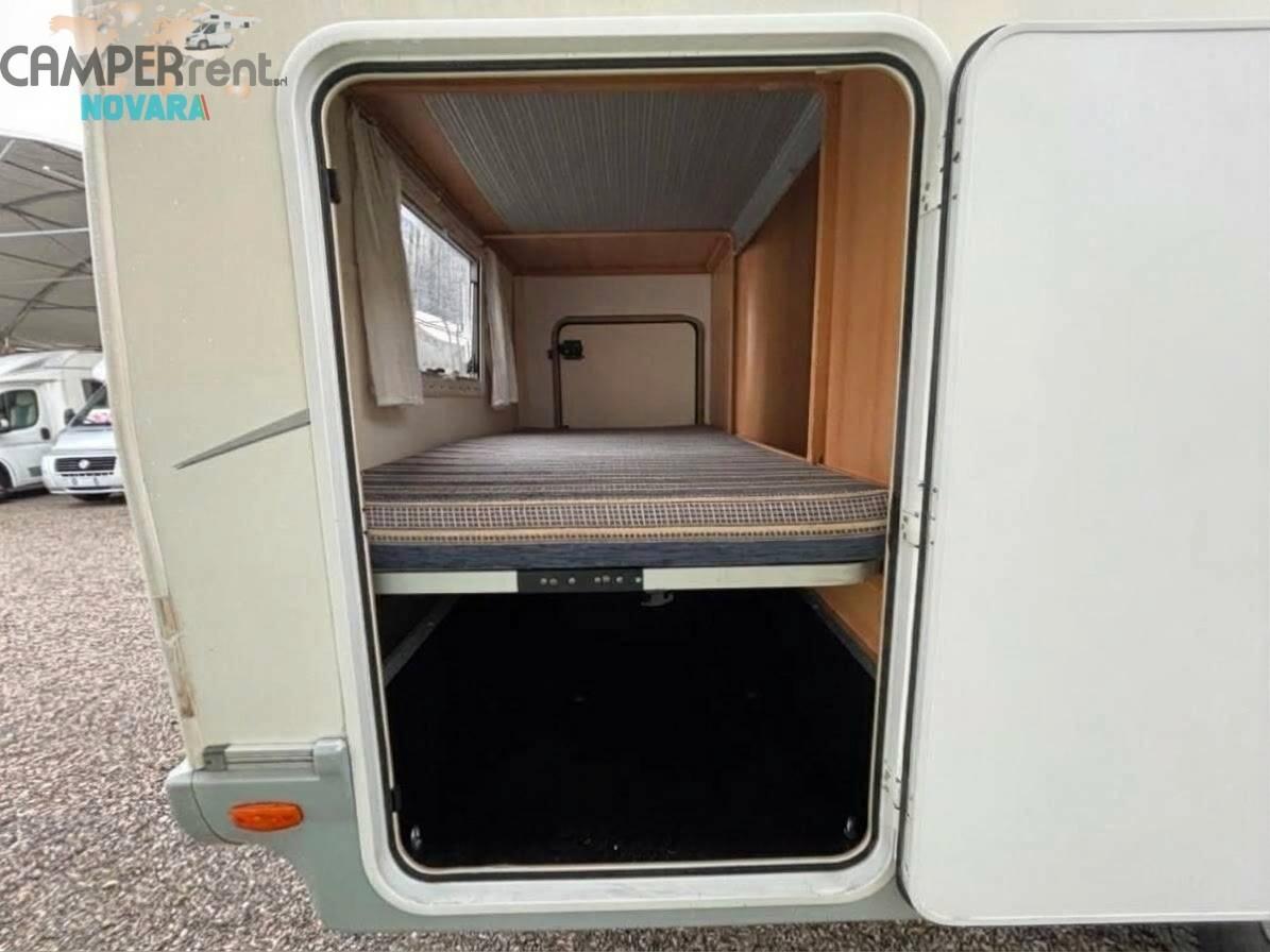 ELNAGH SUPER D 111 c - mansardato con letti a castello in coda e garage a volume variabile