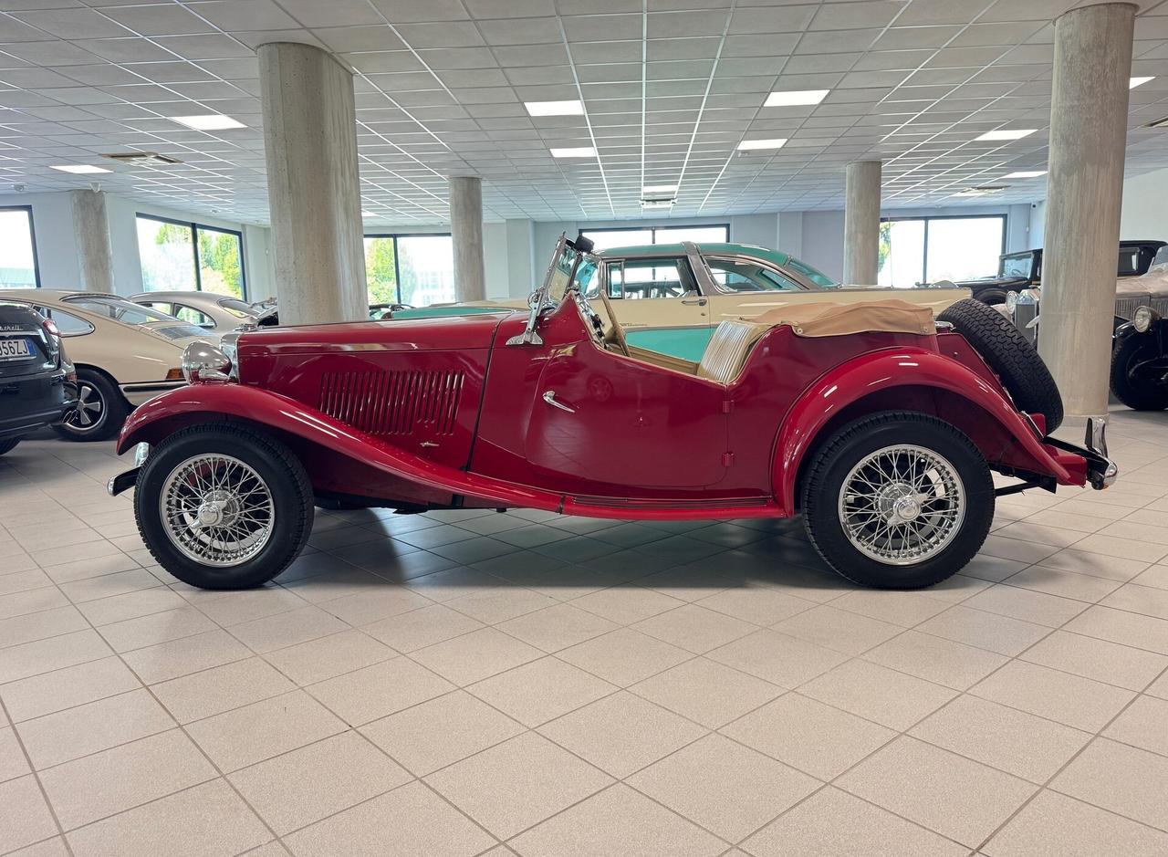 Mg TD .