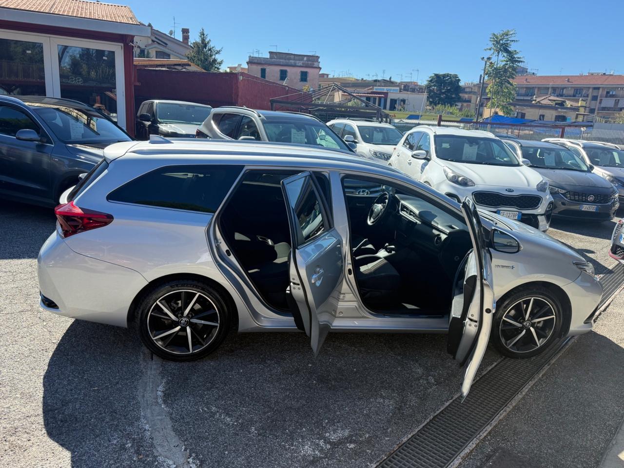 Auris Touring Sports 1.8 Hybrid Lounge-70 mila km -unipro