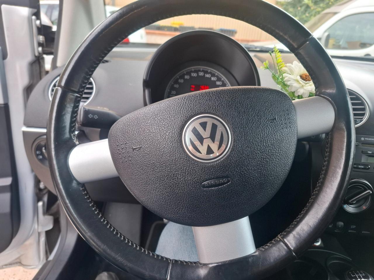 Volkswagen New Beetle Cabriolet - 1.4-16V Highline