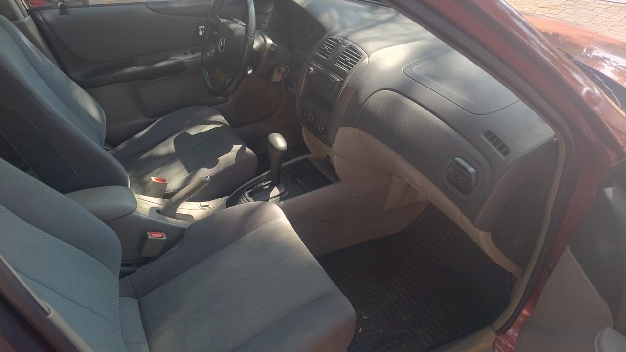 Mazda 323 F 1.6i 16V C. Autom. ASI-CRS clima Ok Neopat.