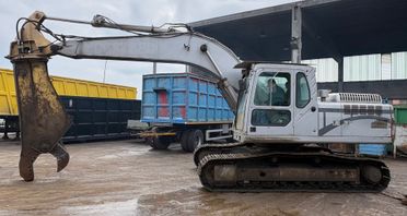 Escavatore VOLVO EC240 + cesoia per rottami